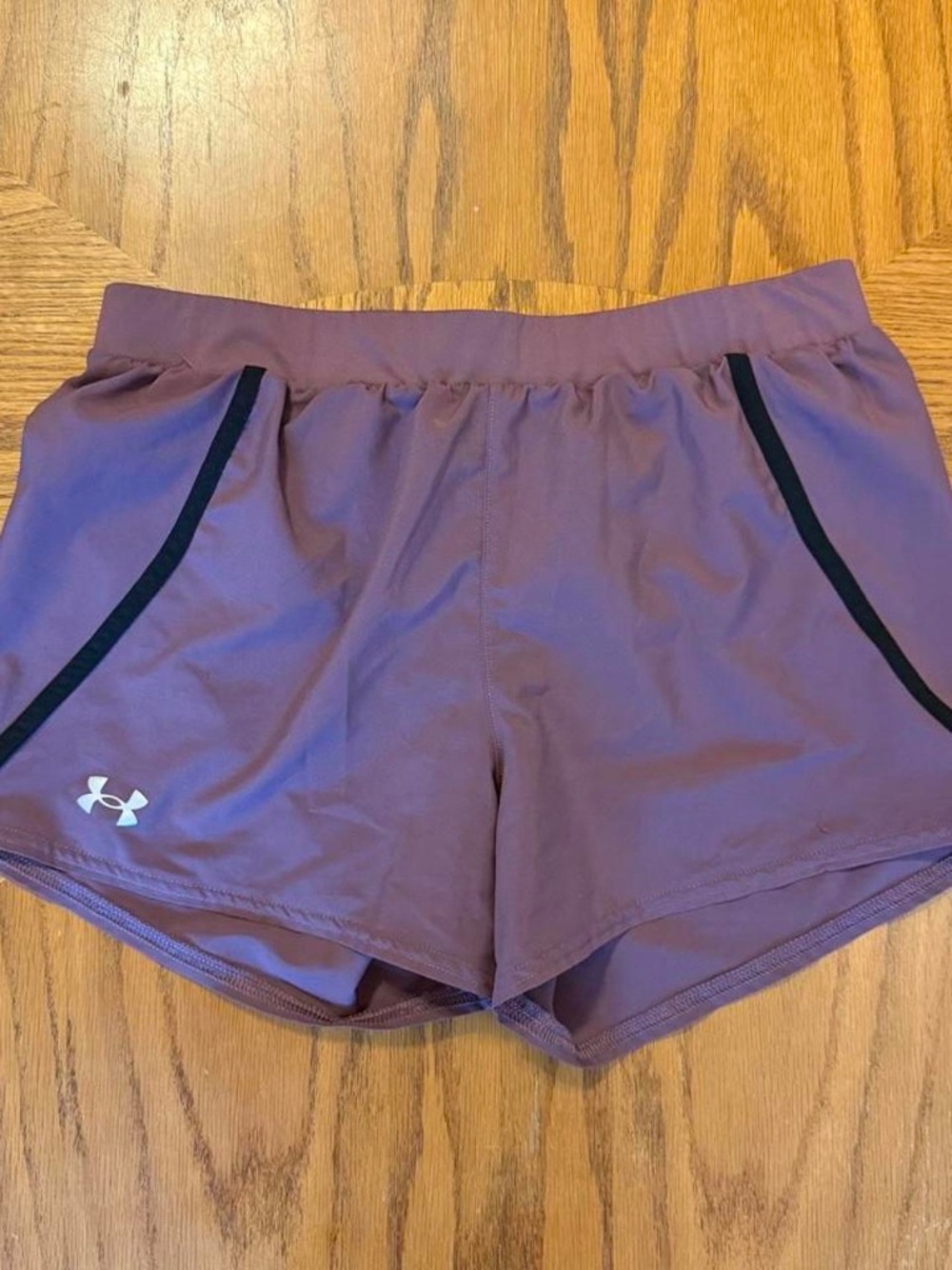 Under Armour purple loose running shorts, size Small/Medium (S/M)